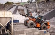 New Loader moving dirt in field,Hitachi Loader moving up with gravel,Loader dropping dirt in truck,Hitachi Wheel Loader moving rocks